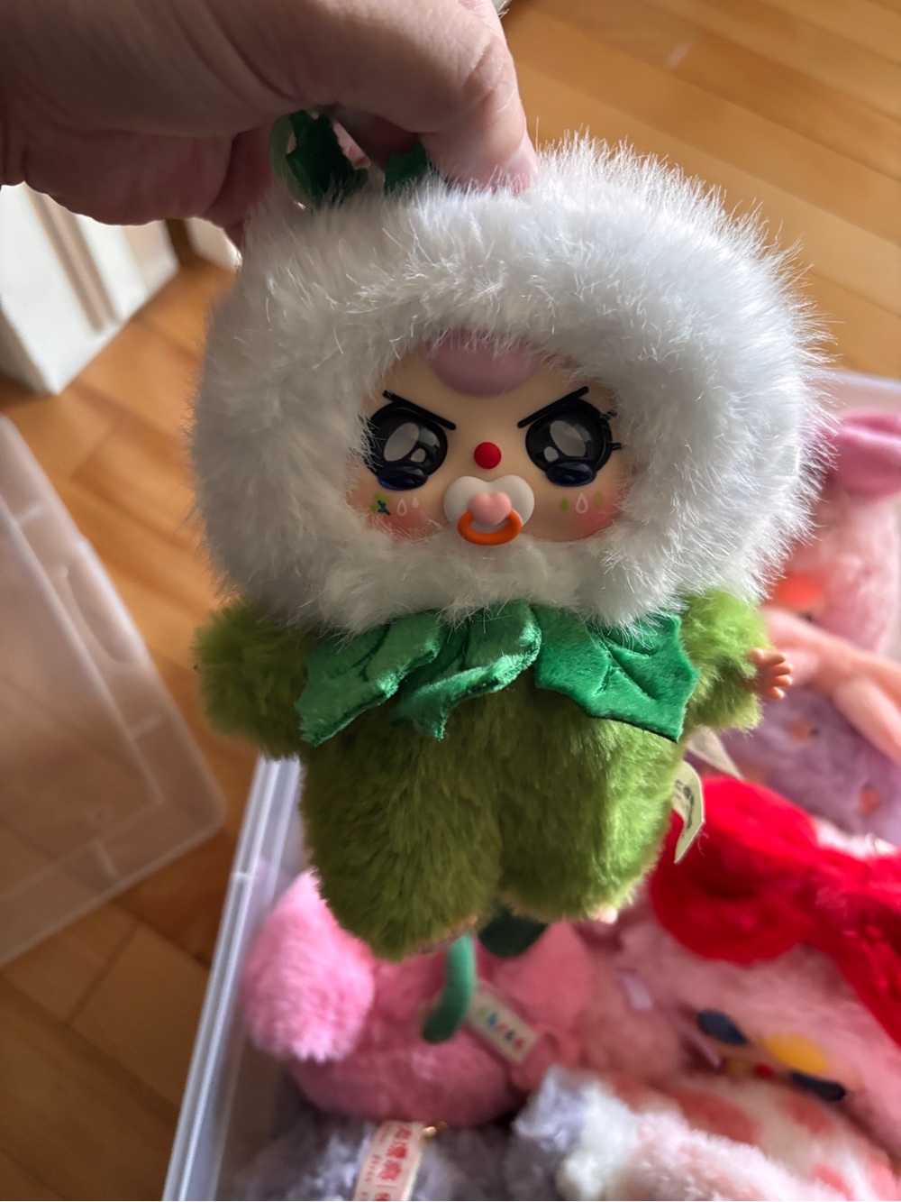 Plush Green Floral Baby Doll with White Fur Hood